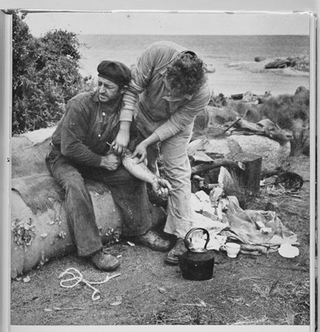 Mutton-birder Roy Goss, bitten by a tiger snake, receives an injection of antivenom from Eric Worrell, Flinders Island, 1955, in Eric Worrell, Song of the snake, Sydney: Angus and Robertson, 1958, p. 197 