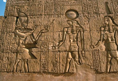 Ptolemaic pharaoh offering incense to Horus, wall relief; credit: Carole Reeves. Wellcome Library, London