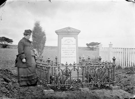 Photographer unknown, Woman by grave, c. 1880; glass negative; 12.2 × 16.6 cm; inscription on headstone: Erected by The Companions & Friends of Mark Marston who departed this life on March 4th 1880 Aged 19 years. Death caused from snake bite. State Library of Victoria, H85.106/3