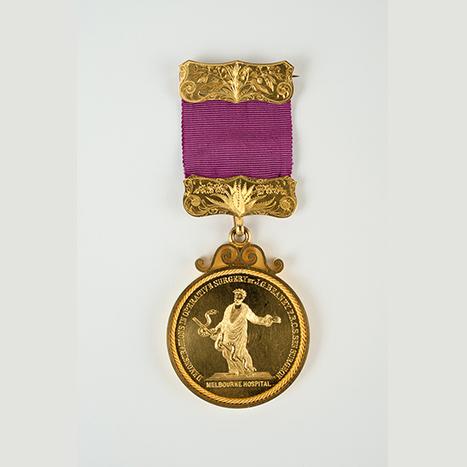 Denis Brothers & Co., The James Beaney Medal for Surgery awarded to Dr Charles J Trood, 1877; gold, fabric; 16.0 x 5.0 x 0.5 cm. Medical History Museum, MHM02417